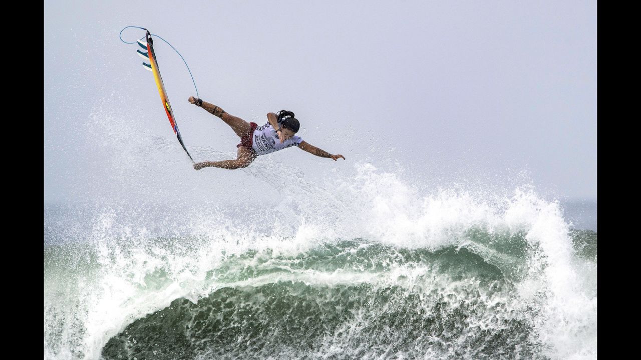 Brazilian surfer Silvana Lima bails off the top of a wave during the US Open of Surfing on Tuesday, August 1.