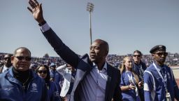 South African main opposition party Democratic Alliance leader Mmusi Maimane gestures as he salutes the crowd during the final Municipal Elections campaign rally at Dobsonville Stadium in Soweto, on July 30, 2016. / AFP / GIANLUIGI GUERCIA        (Photo credit should read GIANLUIGI GUERCIA/AFP/Getty Images)