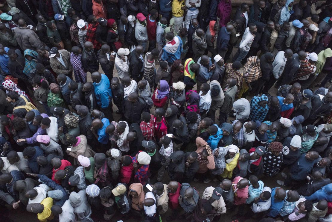 Voters line up at a station in the Kibera area of Nairobi. 