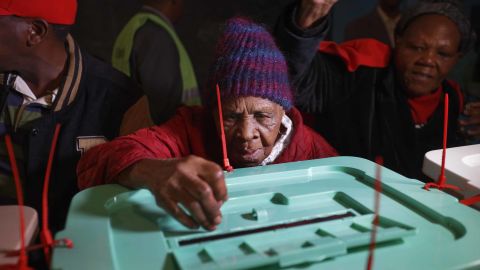 Lydia Gathoni, a Kenyatta supporter, voted just after dawn at a station north of Nairobi.