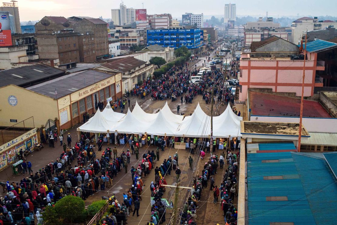 Kenyans wait in line at a polling station in Eldoret on Tuesday.