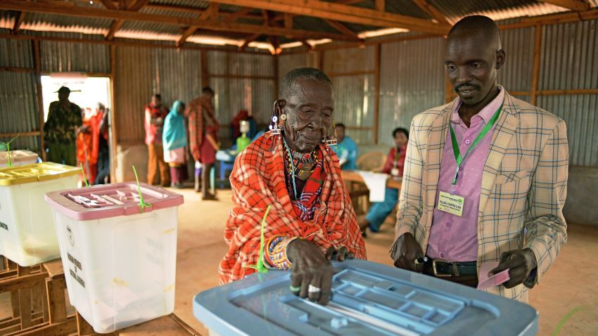 An elderly Maasai lady votes at a polling station in Saikeri, Kajiado West County on August 8, 2017. 
Kenyans began voting in general elections headlined by a too-close-to-call battle between incumbent Uhuru Kenyatta and his rival Raila Odinga that has sent tensions soaring in east Africa's richest economy.  / AFP PHOTO / CARL DE SOUZA        (Photo credit should read CARL DE SOUZA/AFP/Getty Images)