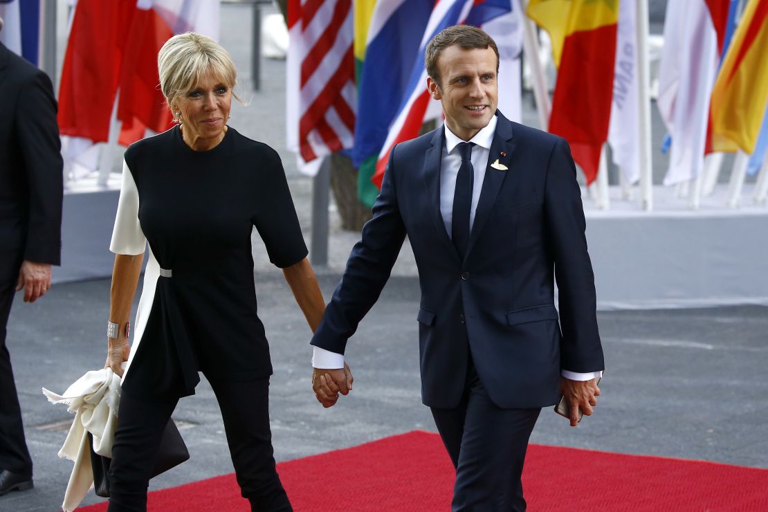Emmanuel and Brigitte Macron arrive at the Elbphilharmonie in Hamburg during the G20 summit.
