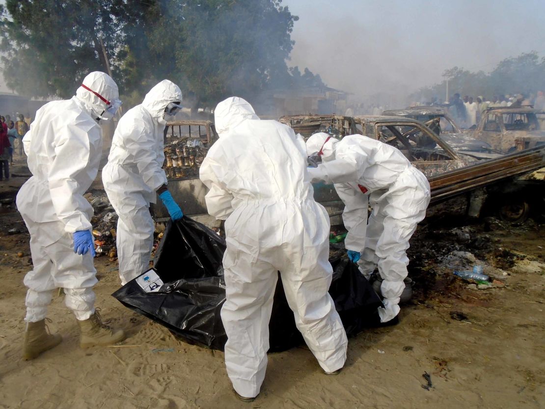Forensics workers at the scene of a blast in Maiduguri on February 17, 2017. As many as seven suicide bombers, including six women, tried to attack the city, but only succeeded in blowing themselves up, emergency services officials said.