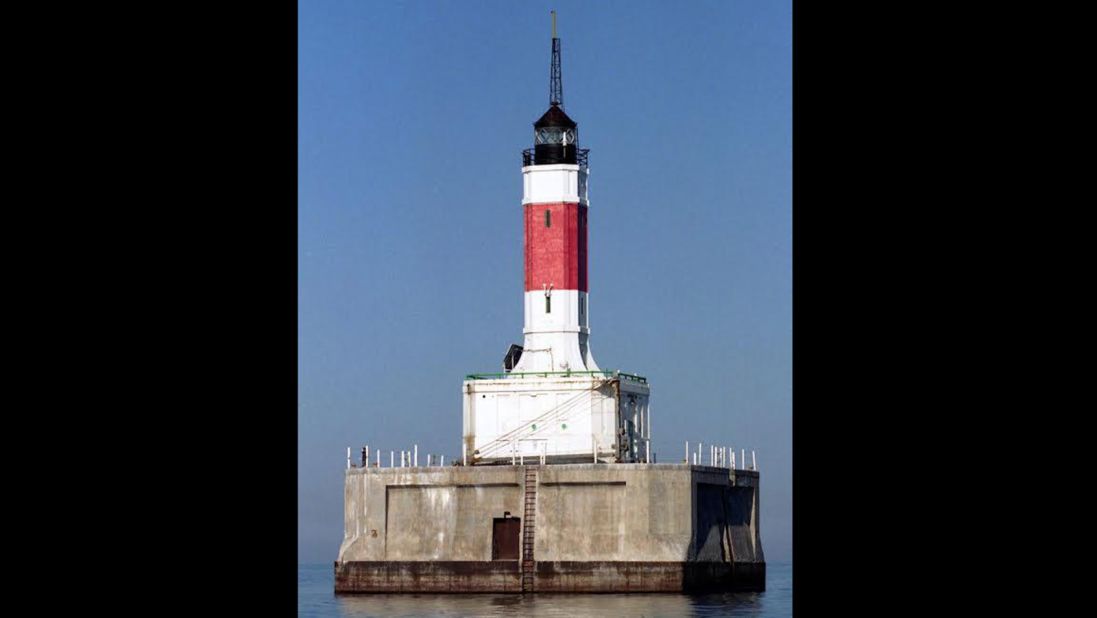 This rocket-like lighthouse, the Minneapolis Shoal Light, is not quite ready for liftoff. It sits in bottomlands owned by the state of Michigan, so the highest bidder must seek the state's authorization to occupy the premises.
