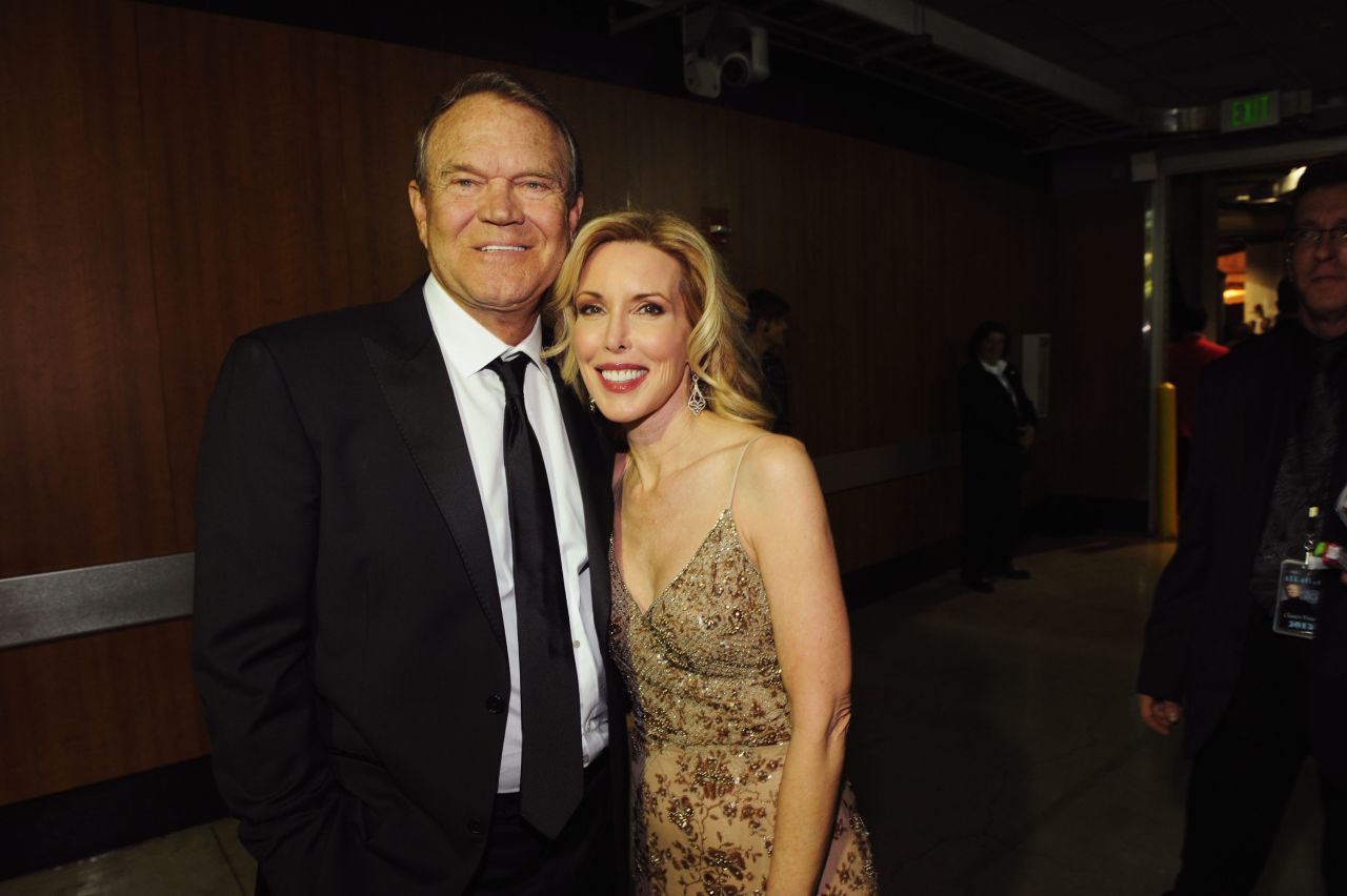 Campbell and his fourth wife, Kim Woollen, attend the Grammy Awards in 2012.