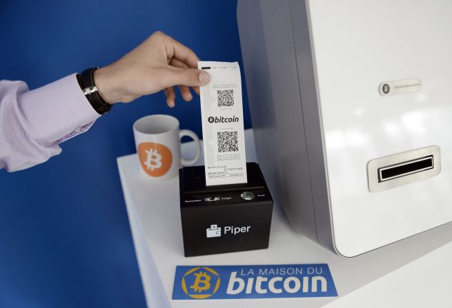Most Bitcoin ATMs -- like this one in Paris -- allow customers to either convert their standard tender into Bitcoin, or withdraw Bitcoin as cash. 
