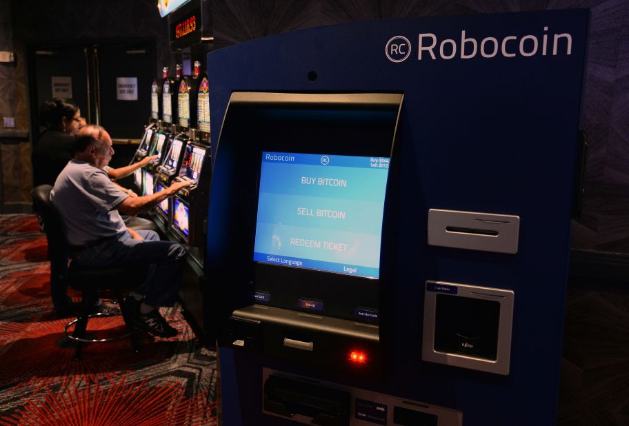 Back in Vegas, The D Casino shows off its Bitcoin ATM. Customers can use it to exchange Bitcoin for cash to bet on the tables, or to turn their winnings into Bitcoin.