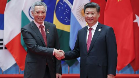 Chinese President Xi Jinping (right) shakes hands with prime minster Lee during the G20 at Hangzhou in 2016.
