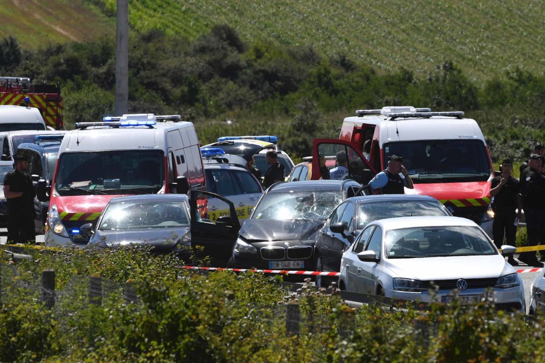 French police and emergency workers intervene on the site after the police arrested a suspect on the A16 motorway, near Marquise.