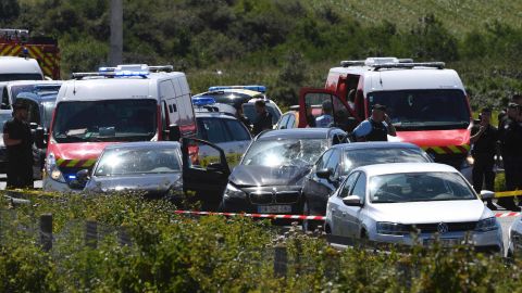 French police and emergency workers intervene on the site after the police arrested a suspect on the A16 motorway, near Marquise.