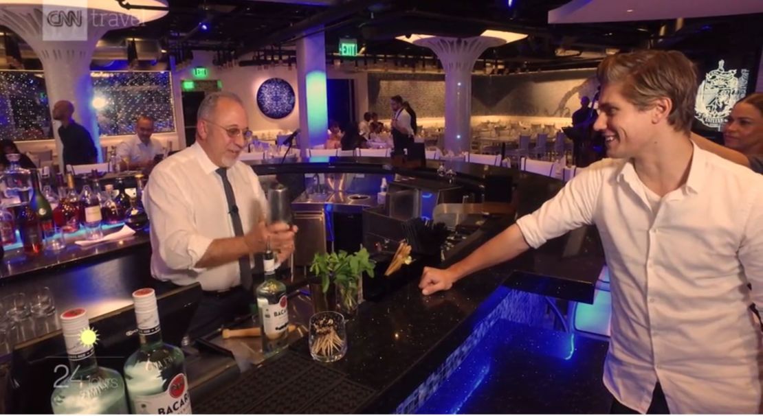 Emilo Estefan mixes a signature Miami mojito for CNN's James Williams.