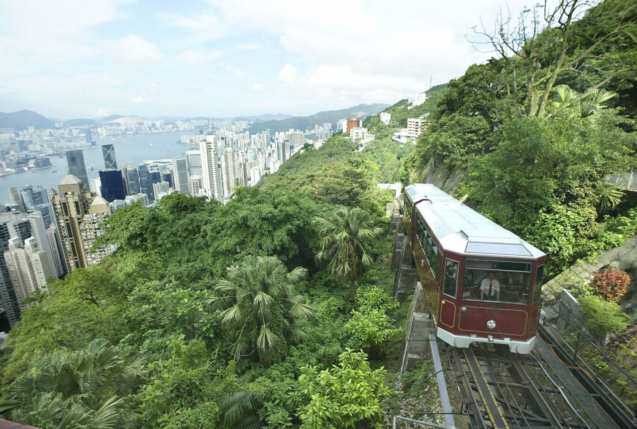 <strong>The Tram: </strong>Hong Kong's famous Peak Tram makes it way up the mountain. The tram began operations in 1888 and has served Hong Kong for 116 years.