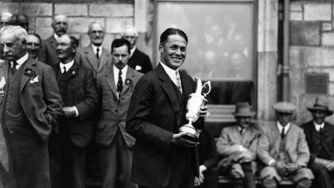 Jones celebrates the second of his three Open Championship wins after victory at St. Andrews, Scotland, in 1927.