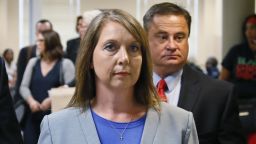 Betty Shelby leaves the courtroom with her husband, Dave Shelby, right, after the jury in her case began deliberations in Tulsa, Okla., Wednesday, May 17, 2017. (AP Photo/Sue Ogrocki)