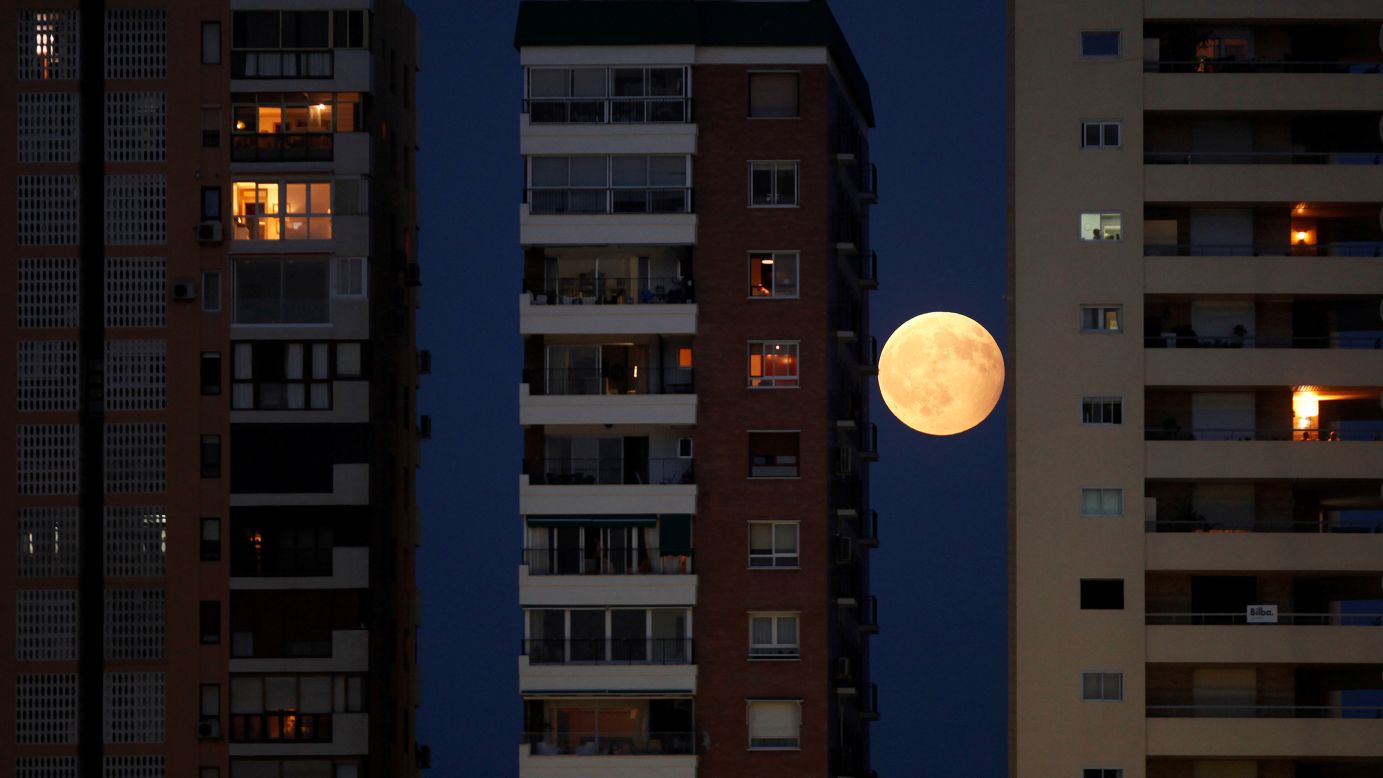 A rising moon is seen between buildings in Malaga, Spain, during a partial lunar eclipse on Monday, August 7. <a href="http://www.cnn.com/2017/08/03/world/gallery/week-in-photos-0804/index.html" target="_blank">See last week in 37 photos</a>