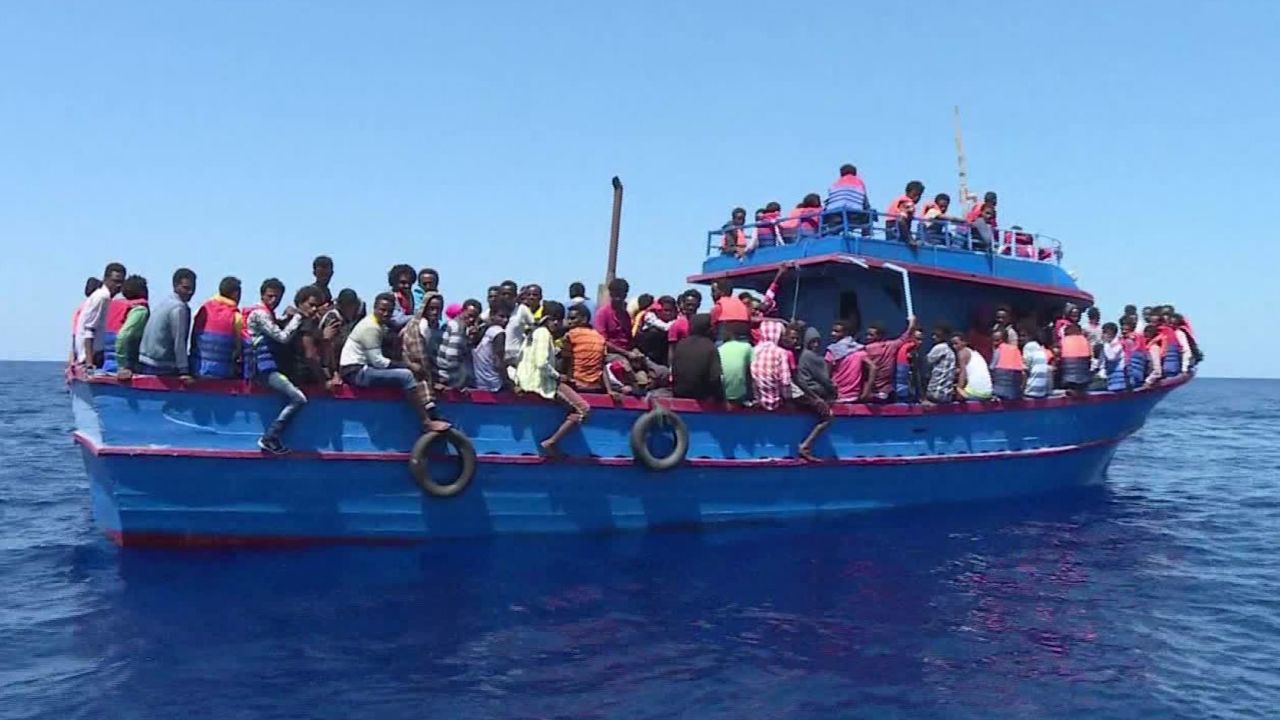 smugglers force migrants off ship yemen damon pkg_00014928.jpg