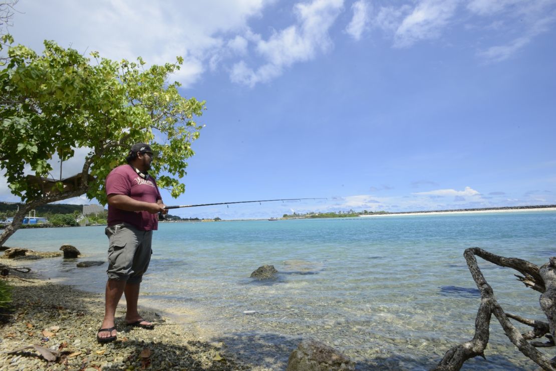 Marco Martinez, 27, fishing in Hagatna.