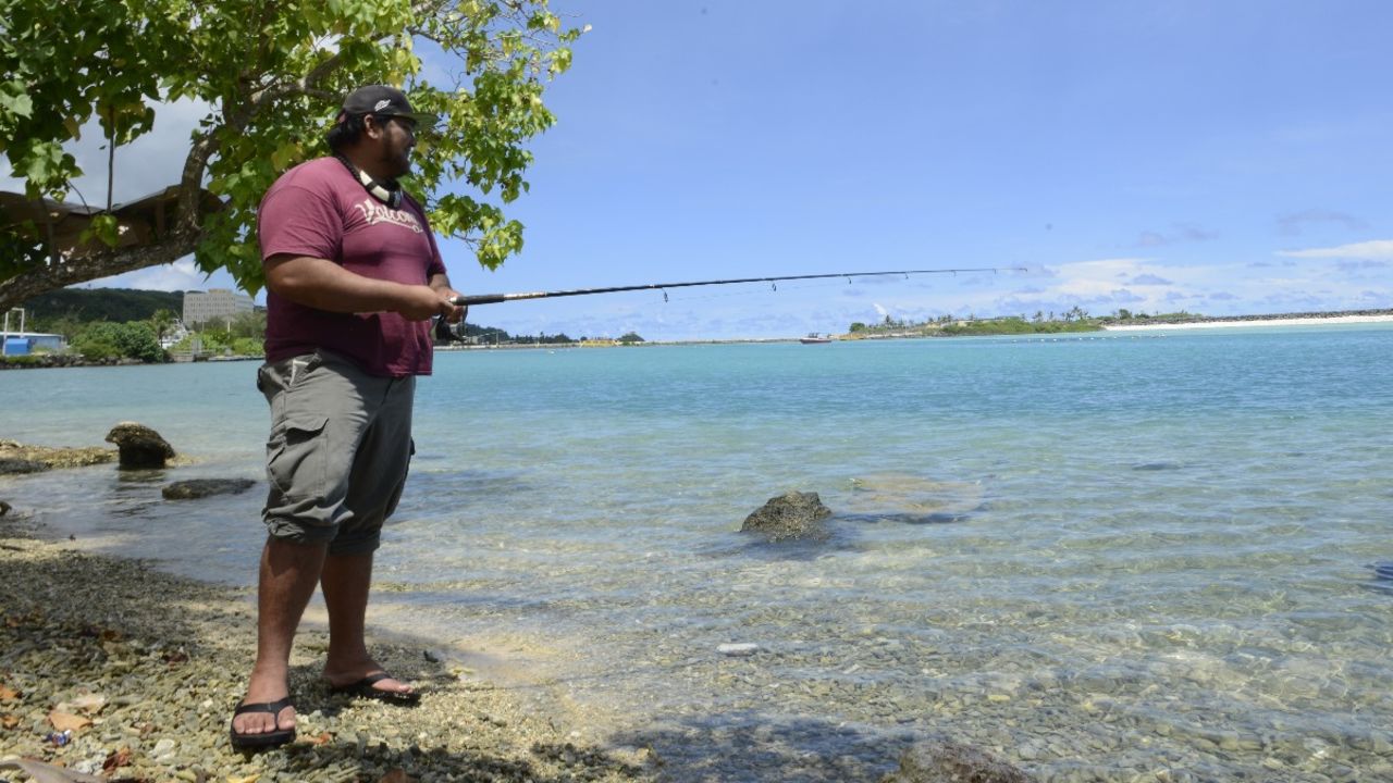 Marco Martinez, 27, fishing in Hagatna. 