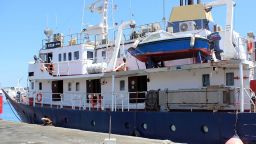 A picture taken on July 27, 2017 shows the C-Star vessel, hired by far-right activists from a group which calls itself "Generation Identity" to prevent would-be migrants from reaching Europem, anchored in the Mediterranean port of Famagusta in the self-proclaimed Turkish Republic of Northern Cyprus (TRNC).
Turkish Cypriot authorities have released the captain and crew of the ship, local media reported and the C-Star was expected to set off across the Mediterranean to Tunisia, said Kibris Postasi. 
The "Defend Europe" scheme was announced by anti-immigration campaigners from France, Italy and Germany after they crowd-funded the 76,000 euros ($87,000) needed to hire the vessel. / AFP PHOTO / STRINGER        (Photo credit should read STRINGER/AFP/Getty Images)
