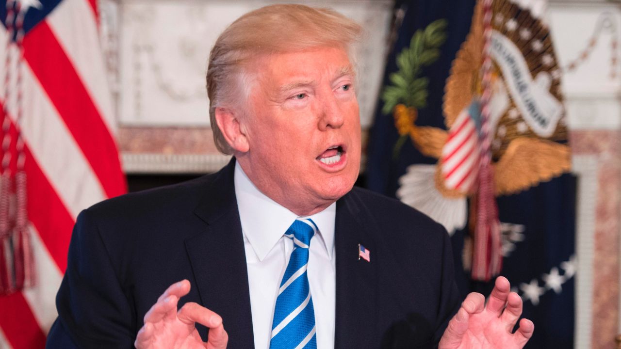 US President Donald Trump speaks to the press on August 11, 2017, at Trump National Golf Club in Bedminster,New Jersey. / AFP PHOTO / JIM WATSON        (Photo credit should read JIM WATSON/AFP/Getty Images)