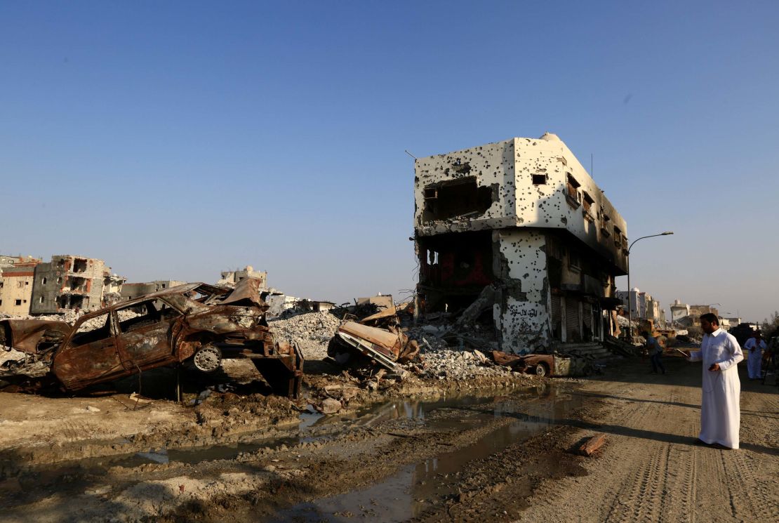 Destroyed cars and buildings in the town of Awamiya.