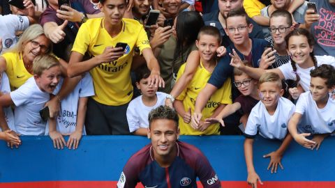 Neymar poses for a photograph at his presentation PSG on August 5.