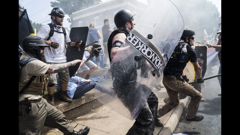 Right-wing rally members clash with counterprotesters in Emancipation Park, where white nationalist groups gathered for a rally. 