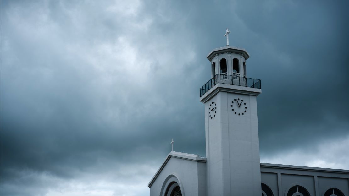 Heavy clouds hover over Dulce Nombre de Maria Cathedral-Basilica in Hagatna, Guam on August 13.