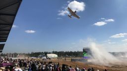 A plane flies over the grounds of the 2017 Russia Army Games in Alabino, Moscow on August 12. 