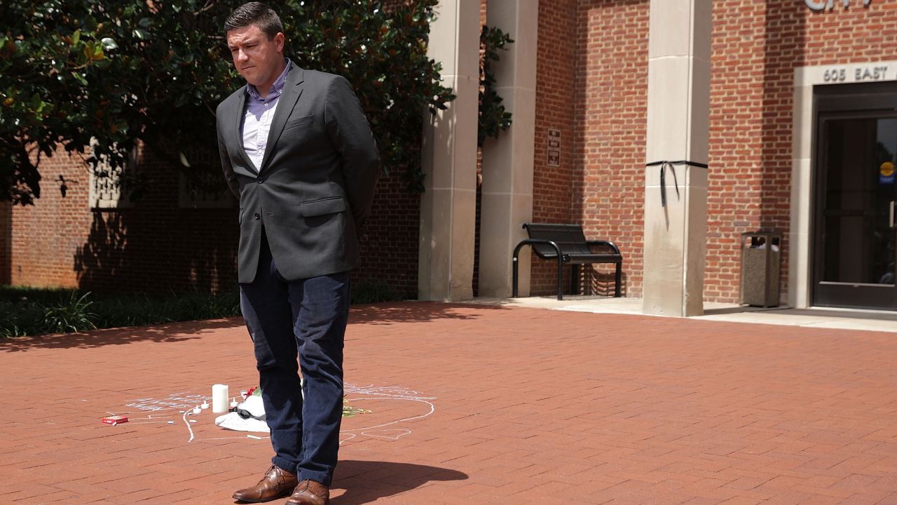 Jason Kessler waits before begnning his remarks