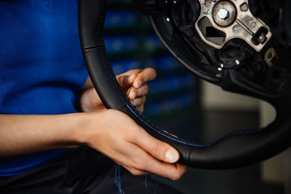 Alpina technicians hand-stitch leather onto its steering wheels, claiming that it makes them feel more comfortable in the hand than machine-stitched patterns.