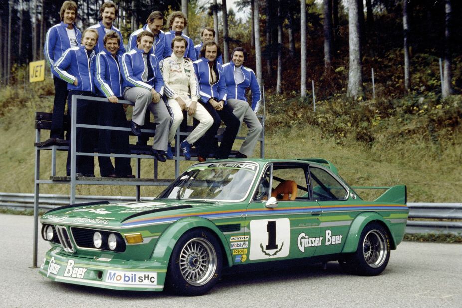 Alpina's founder Burkard Bovensiepen (third from left, top row) celebrates touring car success with his team. Much of the firm's early history with BMW is tied to motorsport.