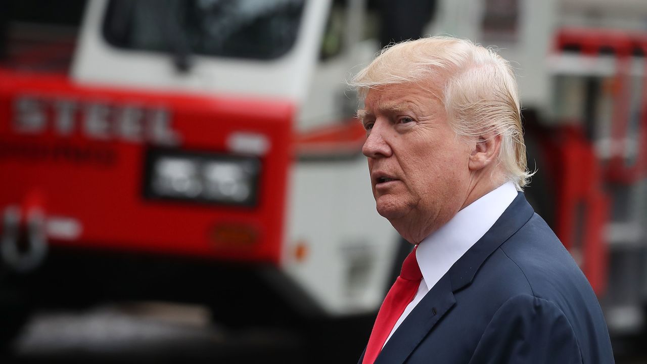 US President Donald Trump walks by as reporters shout questions to him upon his arrival on the South Lawn at the White House on August 14, 2017 in Washington, DC. Later today President Trump will be meeting from Attorney General Jeff Sessions and FBI Director Christopher Wray regarding this weekend?s events in Charlottesville, Virginia. (Mark Wilson/Getty Images)