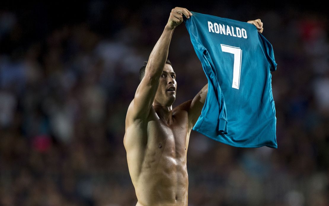 Ronaldo, as Messi did a few weeks ago, raises his shirt to the crowd after scoring.