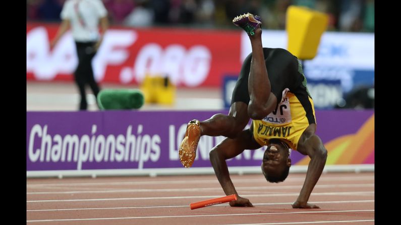Jamaican sprinter Usain Bolt, <a href="index.php?page=&url=http%3A%2F%2Fwww.cnn.com%2F2017%2F08%2F06%2Fsport%2Fgallery%2Fusain-bolt-life-and-career%2Findex.html" target="_blank">the fastest man ever,</a> does a forward roll after cramping up in <a href="index.php?page=&url=http%3A%2F%2Fwww.cnn.com%2F2017%2F08%2F12%2Fsport%2Fbolt-injured-farah-world-athletics%2Findex.html" target="_blank">the final race of his career</a> on Saturday, August 12. Bolt was competing in the 4x100 relay at the World Championships in London.