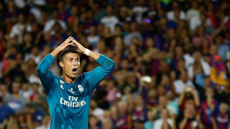 Real Madrid's Cristiano Ronaldo reacts after receiving a second yellow card during the first leg of the Spanish Super Cup on Sunday, August 13. He received the card -- and the automatic ejection -- for what the referee judged to be a dive. Madrid still defeated its bitter rival, Barcelona, by a 3-1 score, but it'll have to play without its talisman for the second leg. Ronaldo <a href="index.php?page=&url=http%3A%2F%2Fwww.cnn.com%2F2017%2F08%2F14%2Ffootball%2Freal-madrid-barcelona-ronaldo-red-card-neymar-psg%2Findex.html" target="_blank">also received an additional four-game suspension</a> for pushing the referee as he left the field.