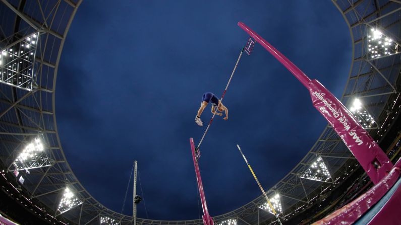 American pole vaulter Sam Kendricks finishes a jump on his way to becoming world champion on Tuesday, August 8.