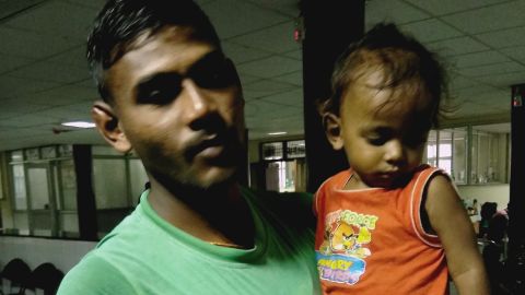 Mohammad Kaimuddin Ansari and his son.