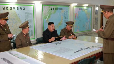 Kim speaks with Strategic Force Commande officers on August 14th in this image distributed by North Korean state media.