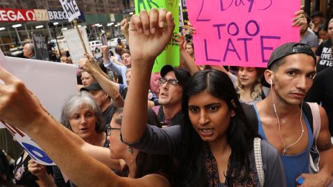 Protesters gather Monday outside Trump Tower along Fifth Avenue in New York.