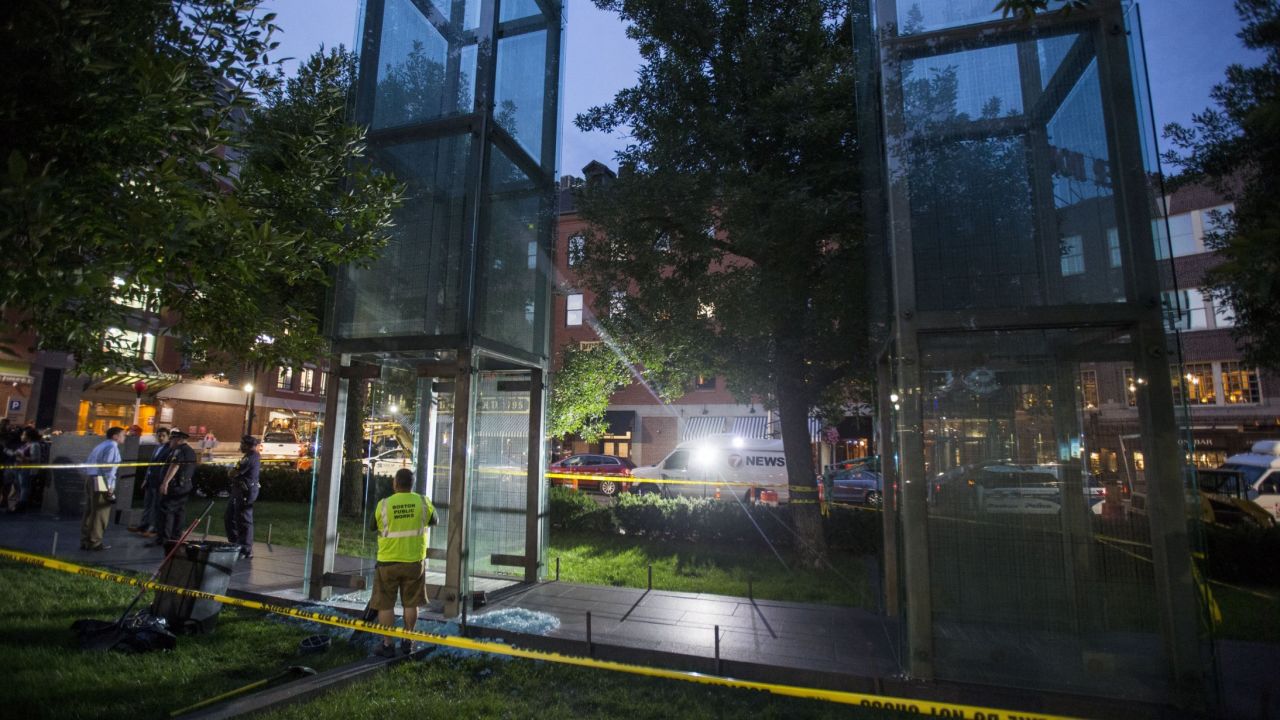 The memorial consists of six glass towers, which are lit up at night.