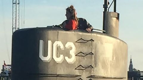 This image is thought to be the final photo of Swedish journalist Kim Wall. She's seen standing with Peter Madsen in the tower of his private submarine on August 10, 2017 in Copenhagen Harbor.