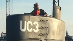 This photo shows allegedly Swedish journalist Kim Wall standing in the tower of the private submarine "UC3 Nautilus" on August 10, 2017 in Copenhagen Harbor.
The submarine sank in the sea outside Copenhagen Harbor on friday night. Following a major rescue operation, a swedish woman supposed to be on board of the submarine is still missing.  / AFP PHOTO / Scanpix Denmark / Anders Valdsted / ALTERNATIVE CROP         (Photo credit should read ANDERS VALDSTED/AFP/Getty Images)