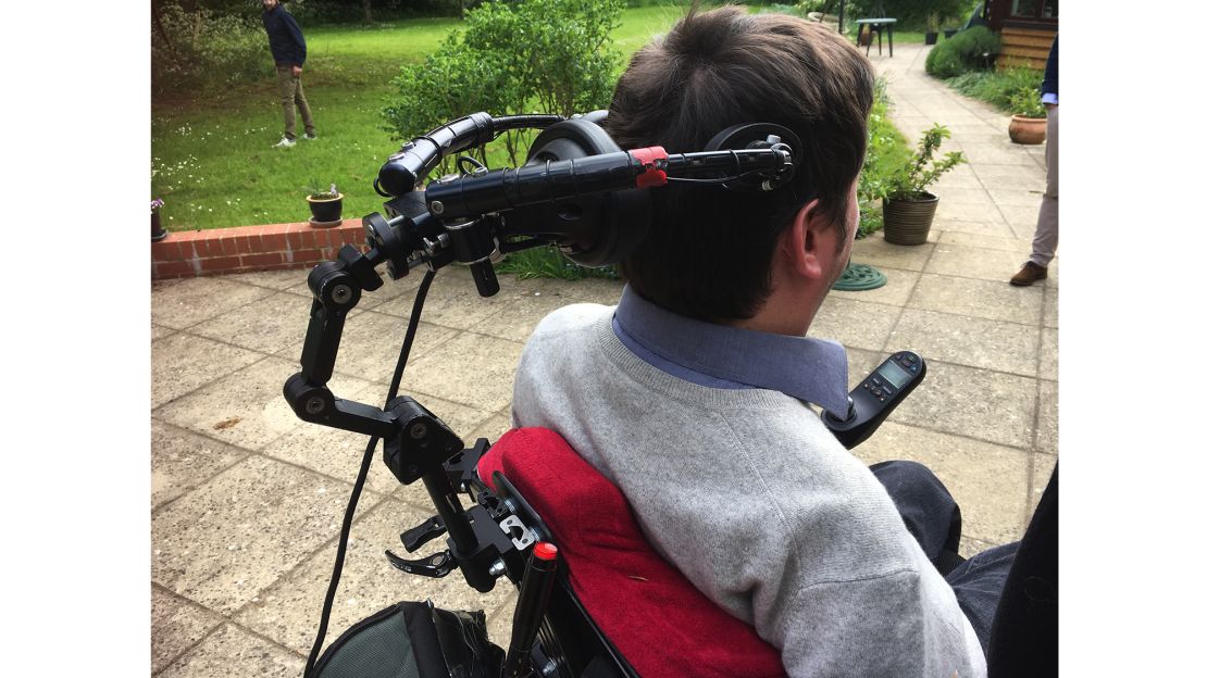 Tom Nabarro uses a head control to move his wheelchair.