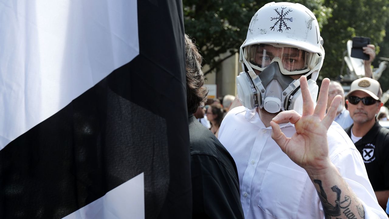 CHARLOTTESVILLE, VA - AUGUST 12:  Hundreds of white nationalists, neo-Nazis and members of the "alt-right" march down East Market Street toward Emancipation Park during the "Unite the Right" rally August 12, 2017 in Charlottesville, Virginia. After clashes with anti-fascist protesters and police the rally was declared an unlawful gathering and people were forced out of Emancipation Park, where a statue of Confederate General Robert E. Lee is slated to be removed.  (Photo by Chip Somodevilla/Getty Images)