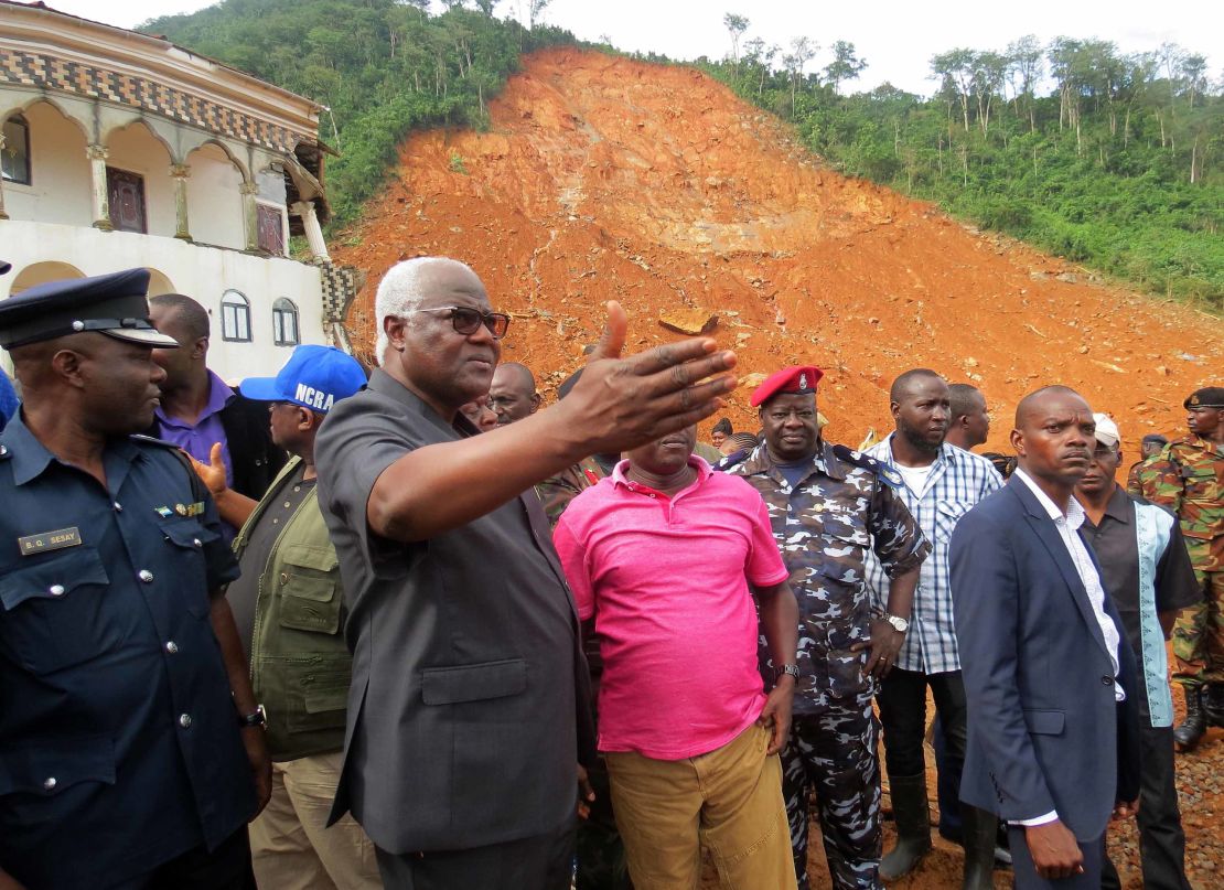 Sierra Leone's President Ernest Bai Koroma visits the site of a mudslide near Freetown on Tuesday.