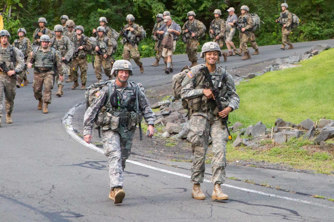 Askew leads West Point Corps of Cadets members as the march back from Camp Buckner to complete basic training. 