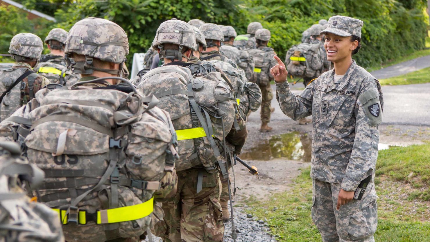 Cadet Simone Askew -- the first African-American woman to be First Captain of West  Point's Corps of Cadets -- cheers on members of the Class of 2021 at a checkpoint.