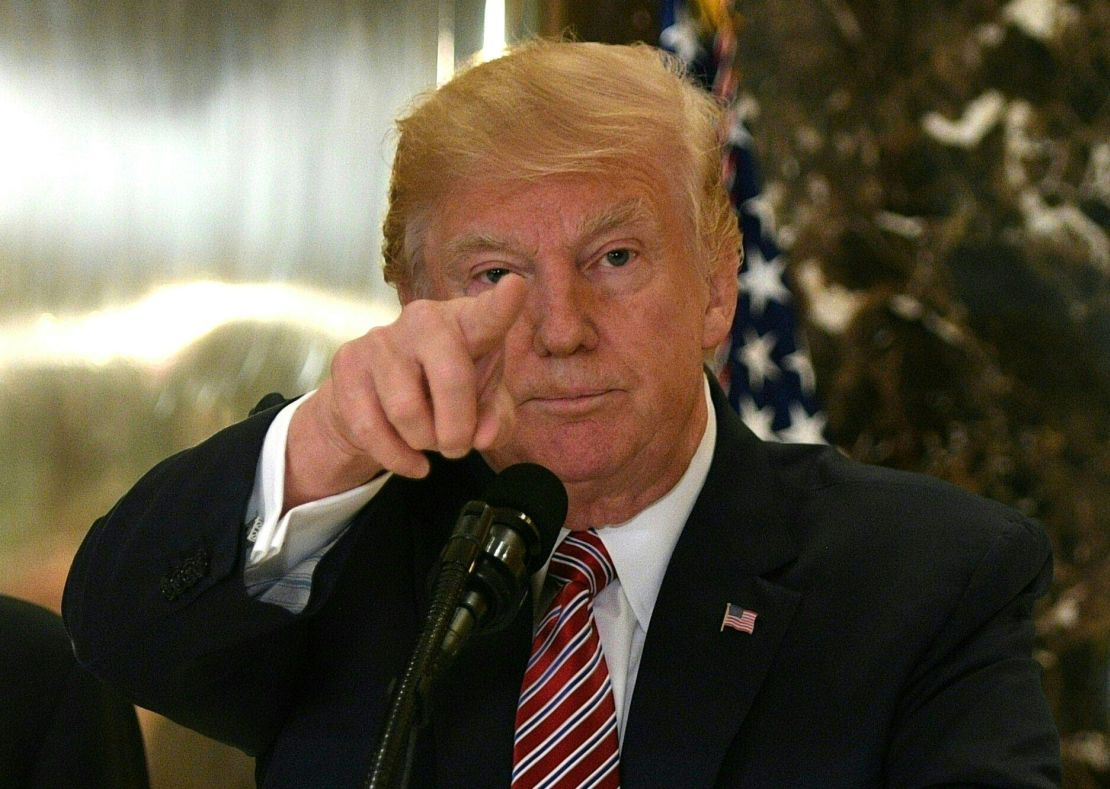 President Donald Trump speaks to the press about protests in Charlottesville after his statement on the infrastructure discussion in the lobby at Trump Tower in New York on August 15, 2017.